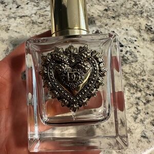 Dolce and Gabbana empty 1.7 oz perfume bottle . Has original box and no damages.